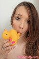 Busty buffy sucking rubber duck long hair