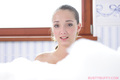 Busty buffy in bubble bath