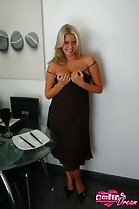 Pulling straps of dress down