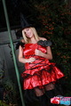 Wearing scarlet dress in witch hat