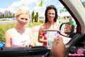 Offering girls money through car window